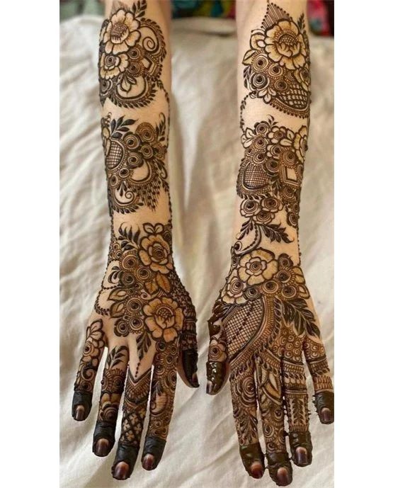 Spiral Droplet Trail On Bridal Mehndi Design