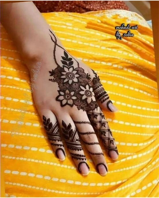 Sleek Orchid With Fusion Along Royal Finger Mehndi Design Sleek Orchid With Fusion Along Royal Finger Mehndi Design