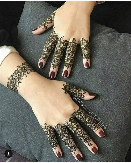 Spiral Droplet Trail On Royal Finger Mehndi Design Spiral Droplet Trail On Royal Finger Mehndi Design